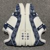 Side view of Louis Vuitton LV Trainer Low-Top Sneakers in blue leather – Sleek silhouette and stylish logo placement for a luxury look.